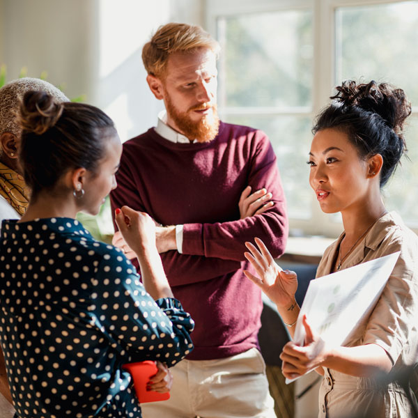 young group of professionals talking
